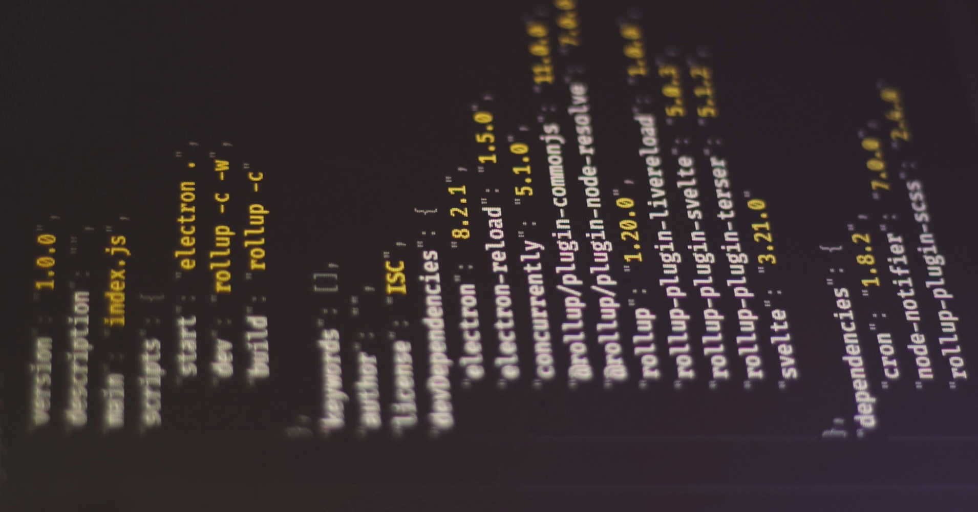 Terminal screenshot showing npm package installation output with version 8.2.1 and dependency tree displaying various rollup plugins including rollup-plugin-commonjs, rollup-plugin-node-resolve, rollup-plugin-livereload, rollup-plugin-svelte, and svelte packages with their version numbers displayed in yellow and purple text on a dark background