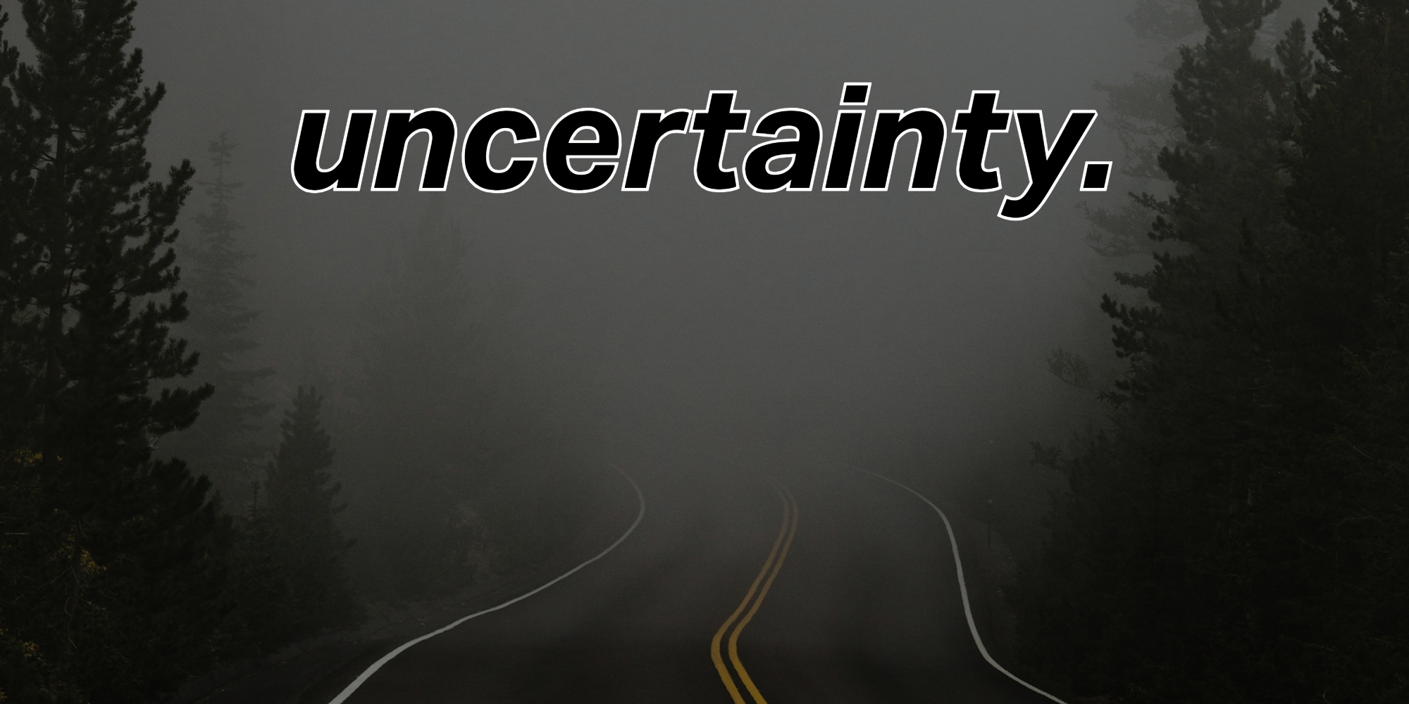 Moody atmospheric image of a foggy forest road disappearing into mist with tall pine trees on either side. The word 